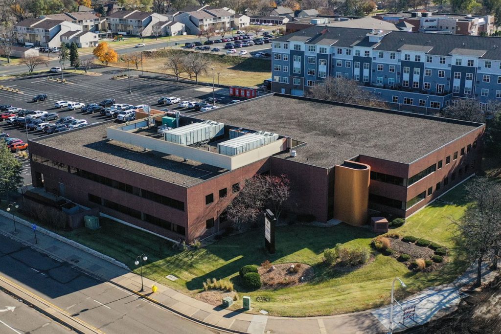 Commercial property at 6499 University Ave NE, Fridley, MN 55432, owned by Manna Capital