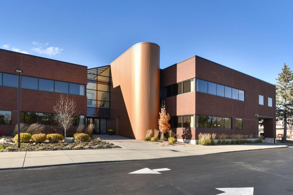 Commercial property at 6499 University Ave NE, Fridley, MN 55432, owned by Manna Capital