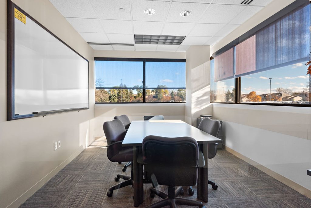 Commercial property at 6499 University Ave NE, Fridley, MN 55432, owned by Manna Capital