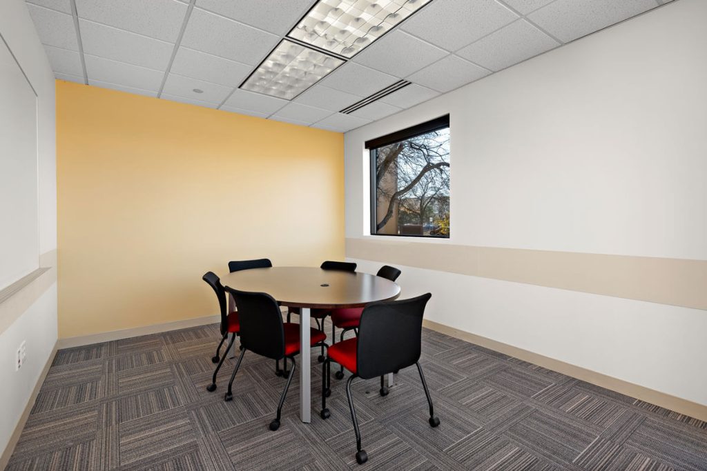 Commercial property at 6499 University Ave NE, Fridley, MN 55432, owned by Manna Capital