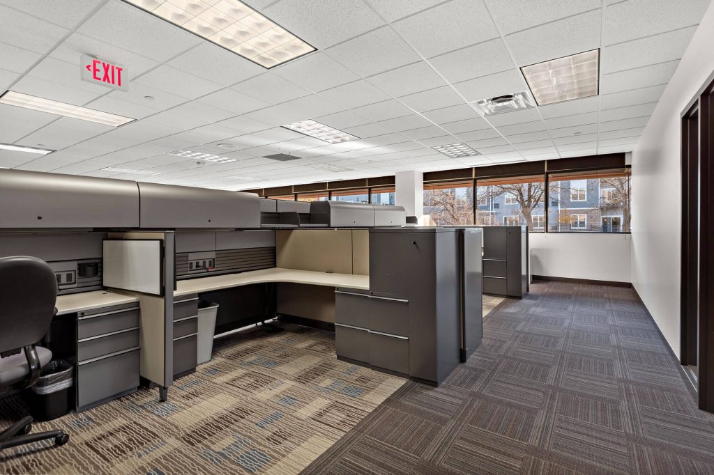 Commercial property at 6499 University Ave NE, Fridley, MN 55432, owned by Manna Capital
