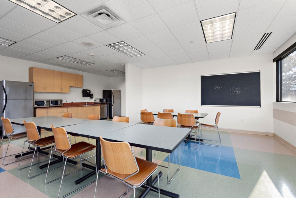 Commercial property at 6499 University Ave NE, Fridley, MN 55432, owned by Manna Capital