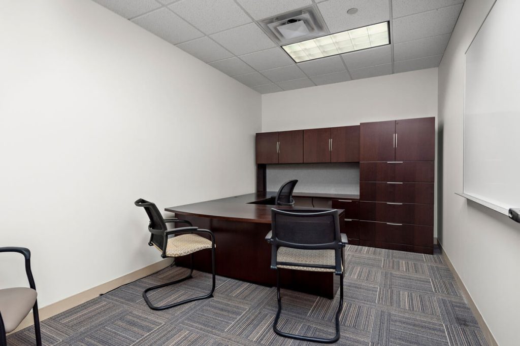Commercial property at 6499 University Ave NE, Fridley, MN 55432, owned by Manna Capital