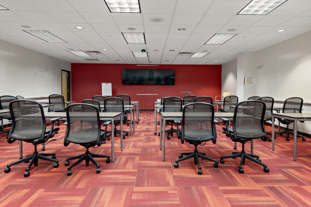 Commercial property at 6499 University Ave NE, Fridley, MN 55432, owned by Manna Capital
