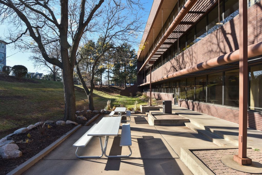 Commercial property at 6499 University Ave NE, Fridley, MN 55432, owned by Manna Capital