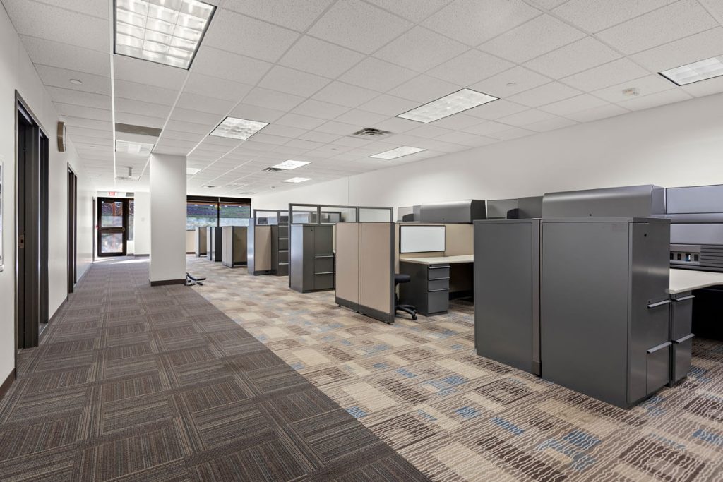 Commercial property at 6499 University Ave NE, Fridley, MN 55432, owned by Manna Capital